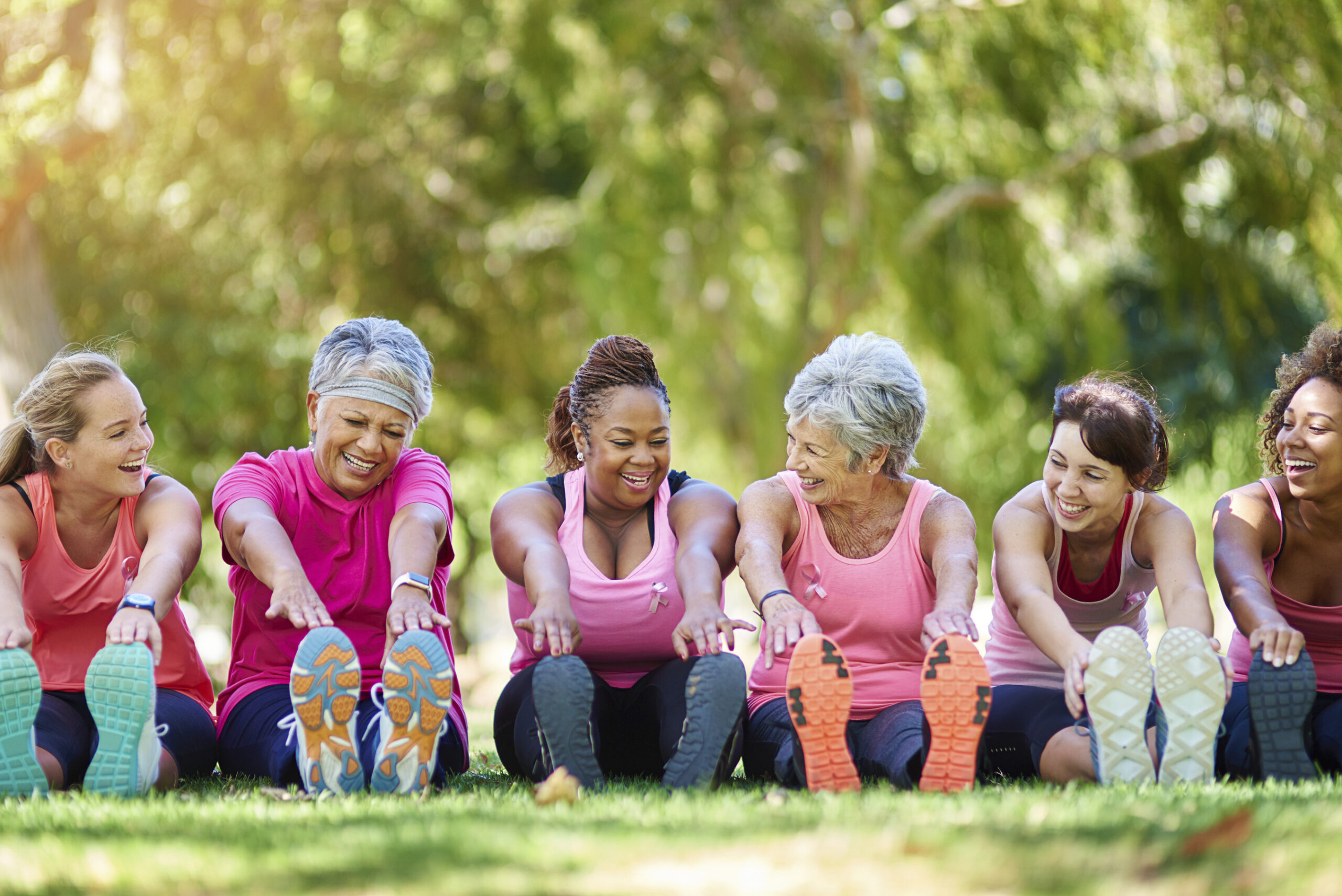 Shot of a group of people warming up outdoors